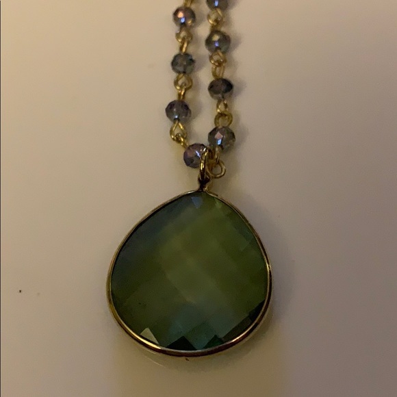 Long necklace in green blue hue glass pendant